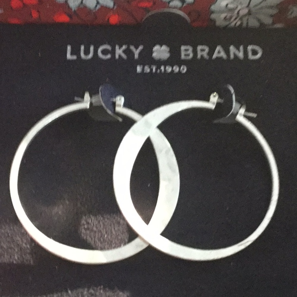 1 1/2 inch hoop earrings.